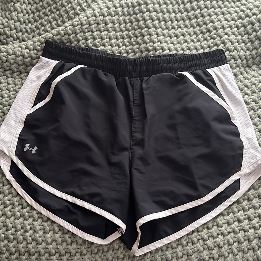 Under Armour.. black and white athletic shorts.